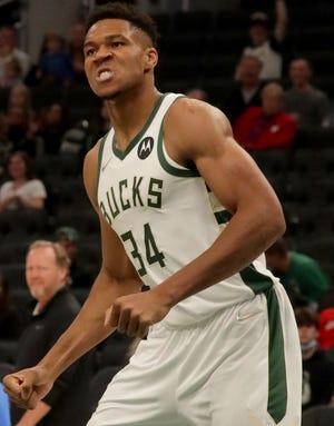 Forward Giannis Antetokounmpo and his Milwaukee Bucks teammates have a long road ahead if they are to repeat as NBA champions.