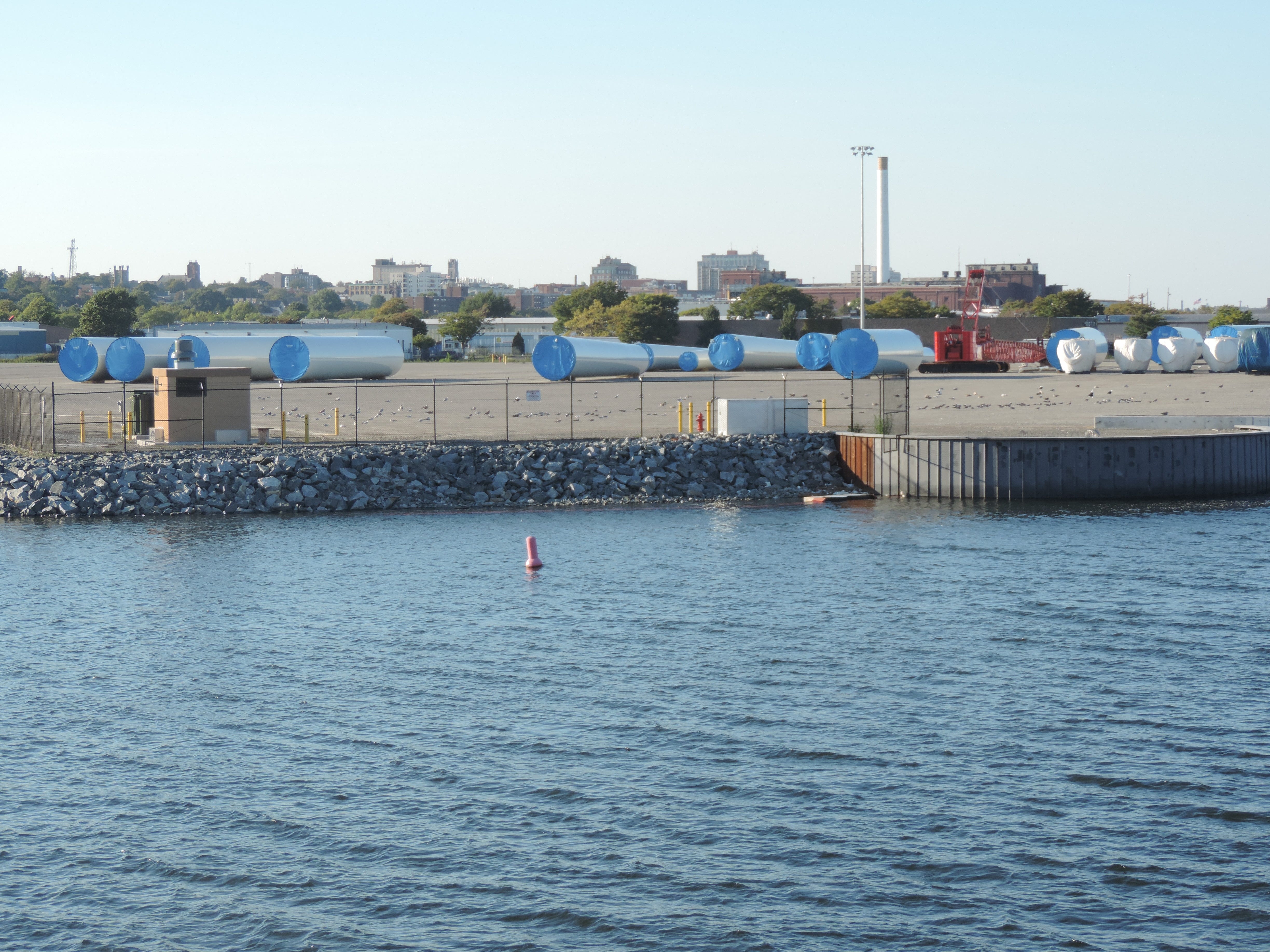 Wind turbine components shipped by Spain-based Gamesa sit at the Marine Commerce Terminal in New Bedford after arriving in the U.S. on two cargo ships.