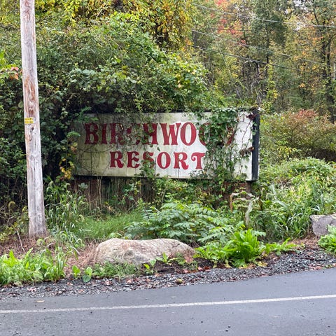 A sign marking the entrance to the former Birchwoo
