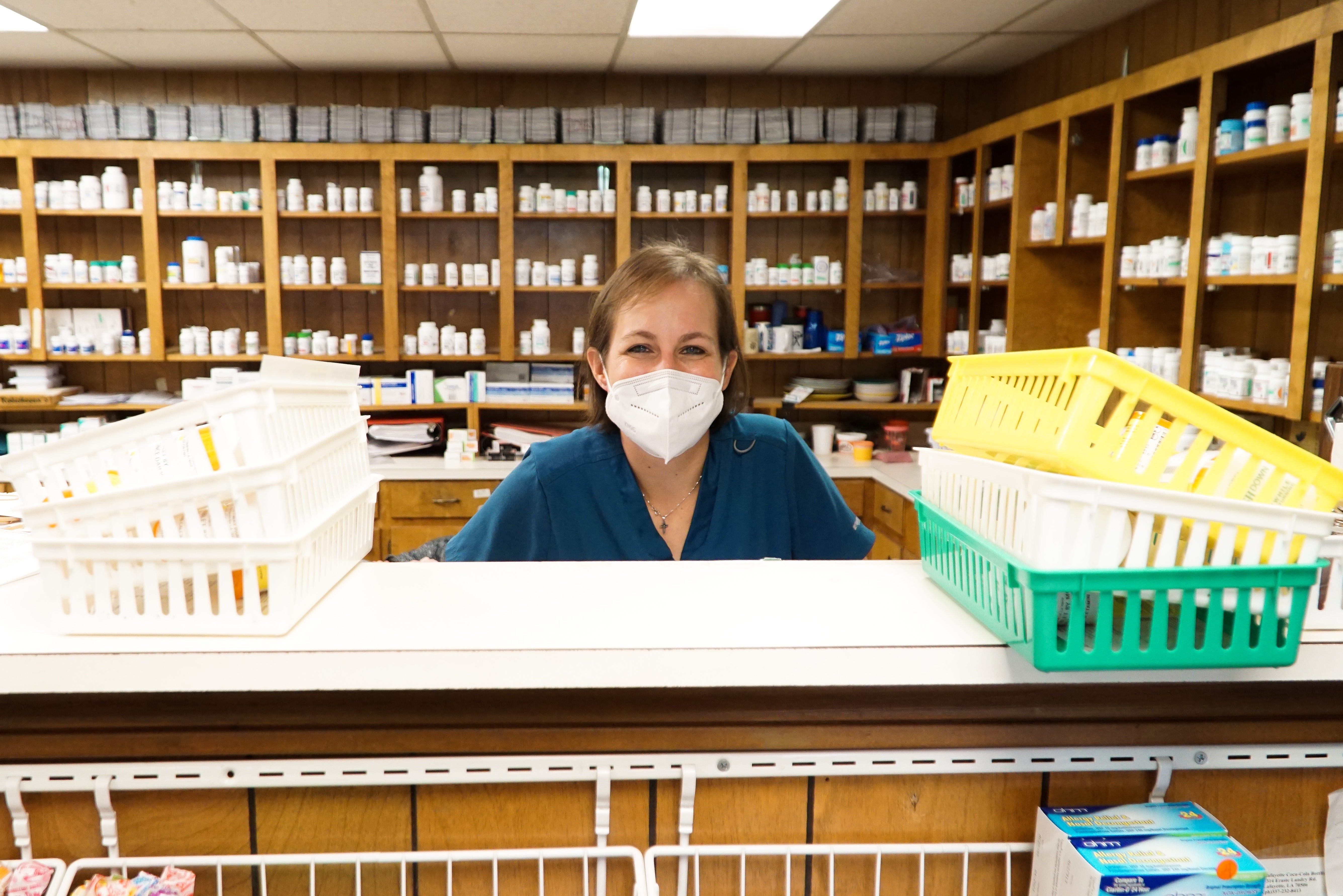 Courtney Pitre has operated Courtney's Thriftway Pharmacy in rural Arnaudville, La., for eight years. She said the coronavirus pandemic has turned her business on its head and run her ragged with work.