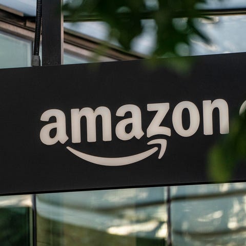 A sign is seen outside of an Amazon Go store at th