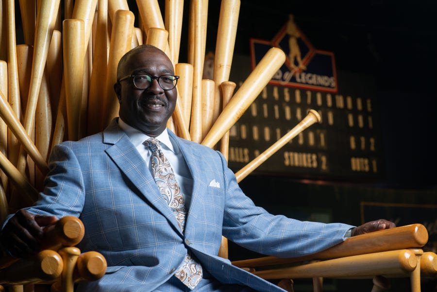 A chair made entirely out of Louisville Slugger baseball bats makes for an ideal throne for Bob Kendrick, president of the Negro Leagues Baseball Museum in Kansas City.