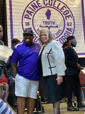 Singer CeeLo Green poses with Paine College President Cheryl Evans Jones just after announcing his partnership with the school.