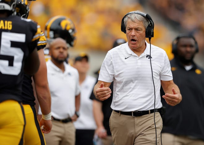 Iowa head coach Kirk Ferentz directs his players during the first half of an NCAA college football game against Penn State, Saturday, Oct. 9, 2021, in Iowa City, Iowa. (AP Photo/Matthew Putney)