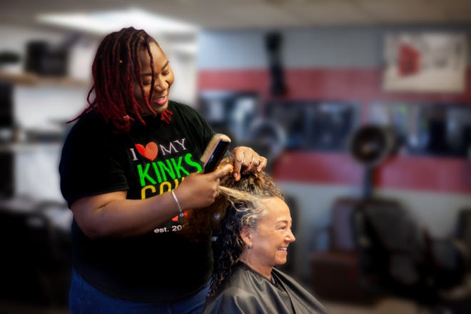 Kimeca Caine, owner of Kinks, Coils & Waves located in DeLand.
