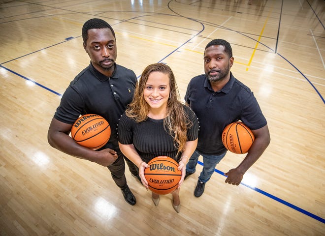Lakeland Royals owner Amy Rhodes is flanked by head coach Charles Jeune, left, and assistant coach David Thornton in Lakeland. The Royals are the newest addition to the Florida Basketball Association, a semipro league. The team will hold tryouts Nov. 13 and expects its inaugural season to kick off in March.
