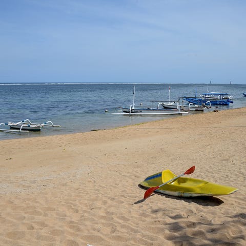 An empty beach awaits visitors in Sanur on Indones