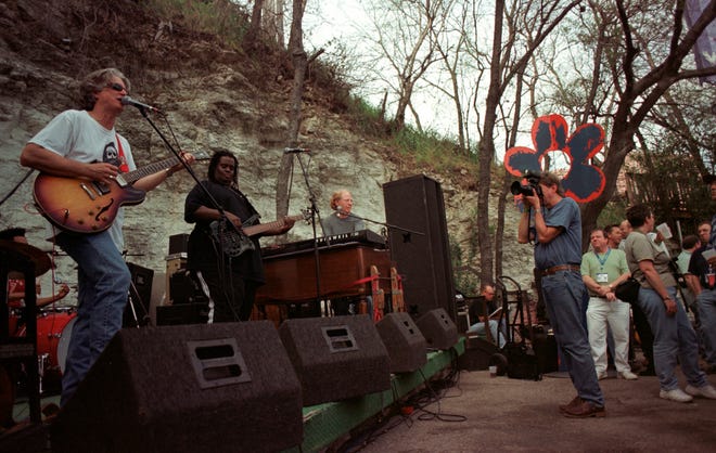 Stephen Bruton and his band, including Yoggie Musgrove, play at Club Deville during the 2002 South by Southwest Music Festival.