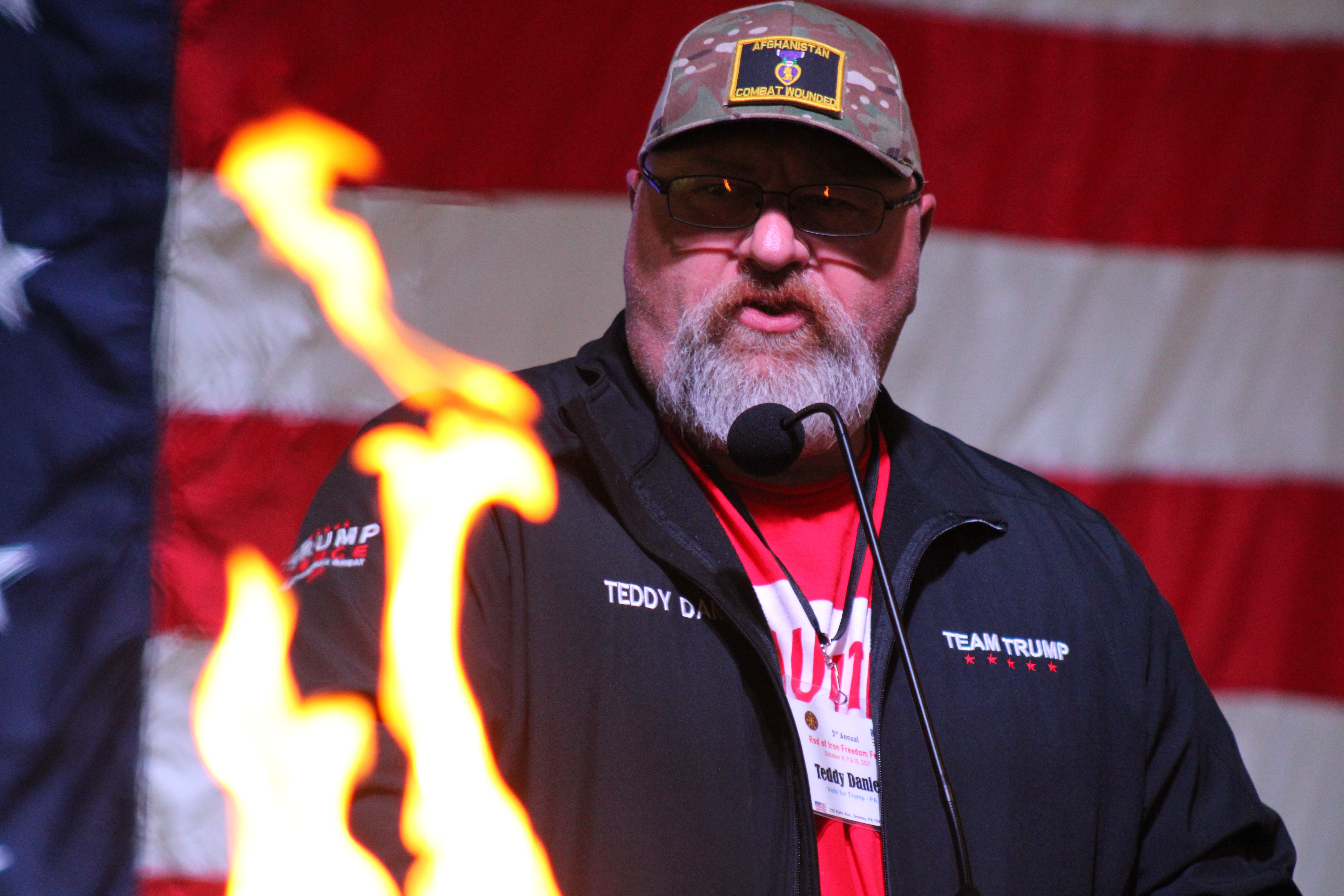 Guest speaker and GOP congressional candidate Teddy Daniels speaks on stage at the Rod of Iron Freedom Festival about the perceived attack of masculinity and liberty.