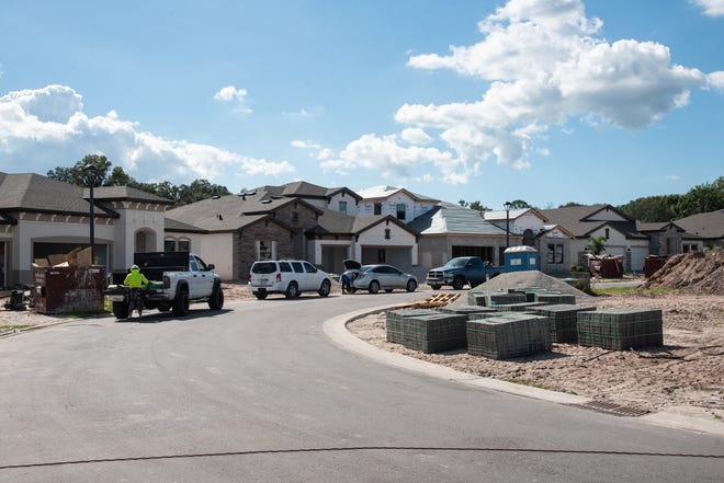 New homes under construction at North River Ranch in Parrish, a master-planned community that is currently under development in the area.
