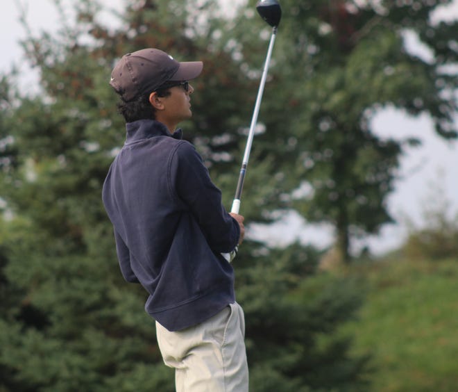 Pleasant's Minoy Shah watches his shot during the first day of the OHSAA Division II State Boys Golf Tournament last fall at NorthStar Golf Course in Sunbury.