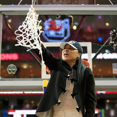 Dawn Staley of the South Carolina Gamecocks cuts d