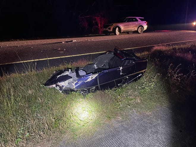 A side car that was attached to a Honda was torn off and landed on the side of the road after a crash on Friday night.