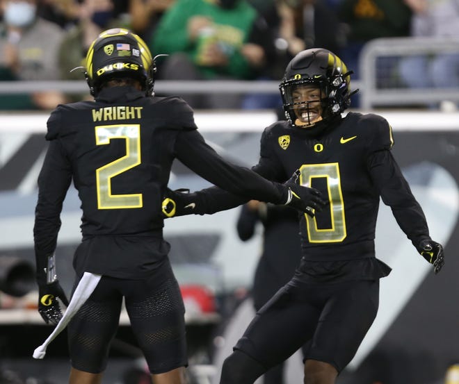Oregon cornerbacks Mykael Wright (2) and DJ James go against a Utah offense that was second in the Pac-12 in scoring offense and fourth in total offense.