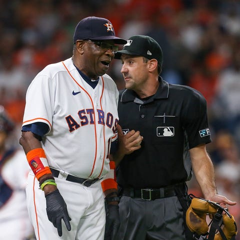Houston Astros manager Dusty Baker talks with home