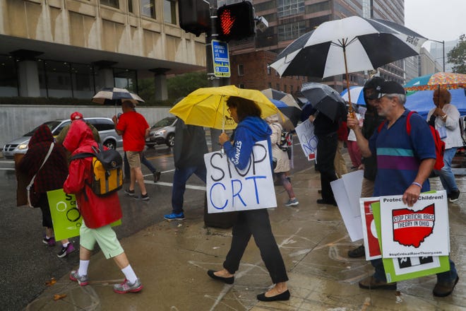 A group protesting critical race theory rallies near the Ohio State Board of Education Sept. 21, 2021, in Columbus. Race and inclusion in education has played a big role in the state's GOP primary for an open U.S. Senate seat.