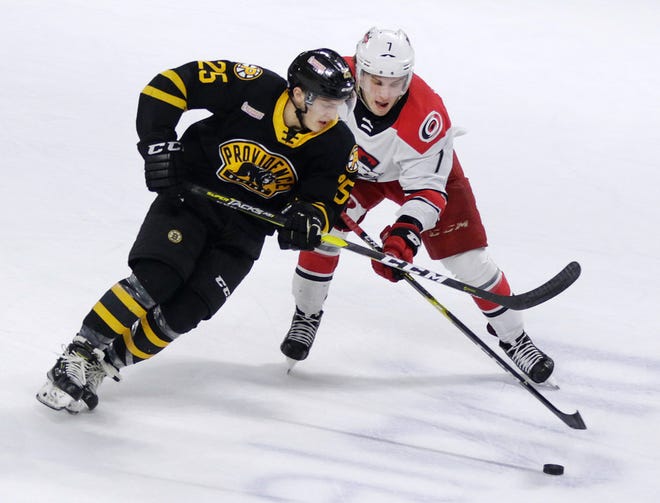 Prior to Saturday night, the last time the Providence Bruins skated at the Dunkin' Donuts Center was 2020 before the pandemic ended their season early and forced the 2020-21 season to be played in Marlboro, Mass. Pictured is Cooper Zech battling Charlotte's Aleksi Saarela in an April 2019 game.