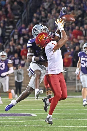 Kansas State safety Russ Yeast (2) breaks up a pass intended for Iowa State wide receiver Tarique Milton (1) during their Oct. 16 game at Bill Snyder Family Football Stadium in Manhattan.