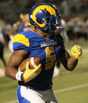 Angelo State University's CJ Odom runs the ball against UT Permian Basin in a homecoming contest at LeGrand Stadium at 1st Community Credit Union Field on Saturday, Oct. 16, 2021.