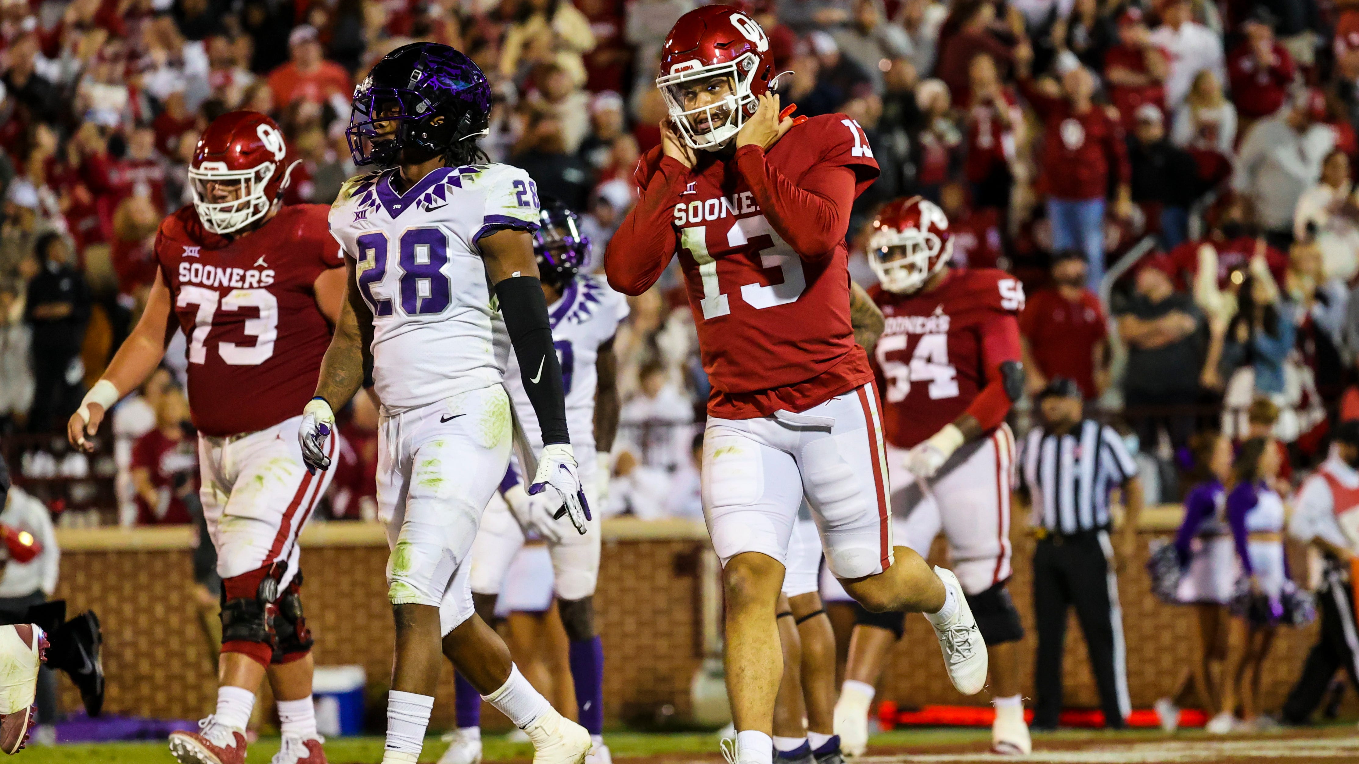 Oklahoma quarterback Caleb Williams (13) reacts after scoring a touchdown during the second half against TCU at Gaylord Family-Oklahoma Memorial Stadium.