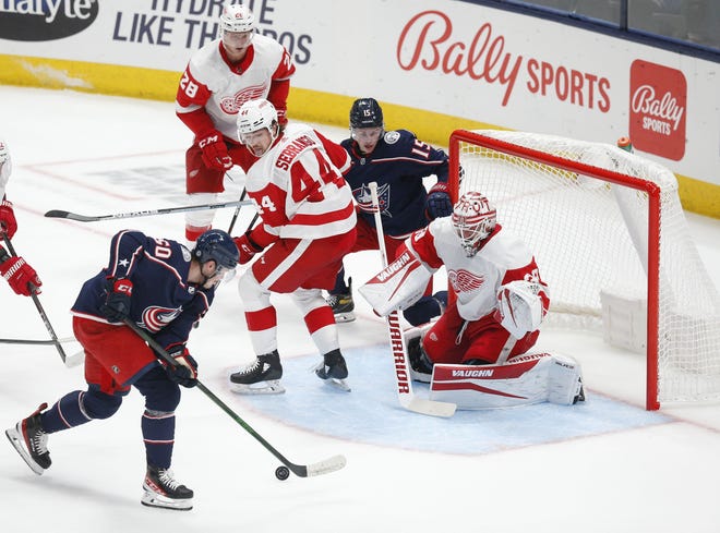 Blue Jackets left wing Eric Robinson takes a shot at the goal on Oct. 6.