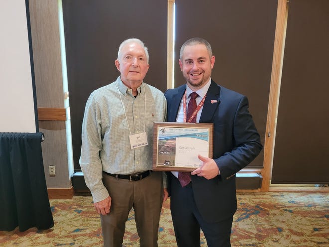 Sid Kemmis, left, president of Gen-Air Airport in Geneseo; and Clayton Stambaugh, director, Aviation Division of Illinois Department of Transportation, are shown at the recent Illinois Public Airports Association Fall Conference in Galena, when Geneseo’s Gen-Air Park was named “Best Privately-Owned Public Airport of the Year.”