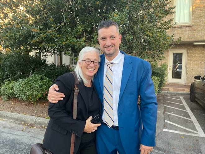 Melanie Keene, left, and attorney Walter Rodriguez pose for a photo following the not guilty verdict on Friday, Oct. 15, 2021.