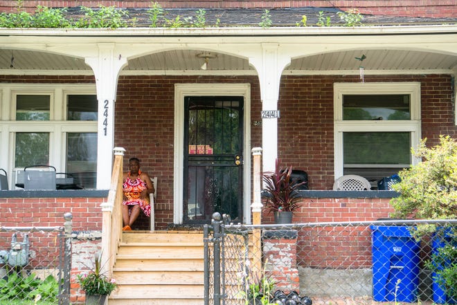 Daisy Jackson, a Detroit resident of over 50 years sitting on the front porch of the home that she and her family have lived in for four generations on June 27, 2021.