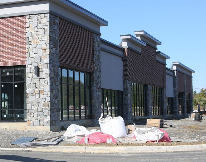 Other retail shops currently under construction in the Barley Mill Plaza in Greenville.  The site will be anchored by a Wegmans grocery store that recently began construction.