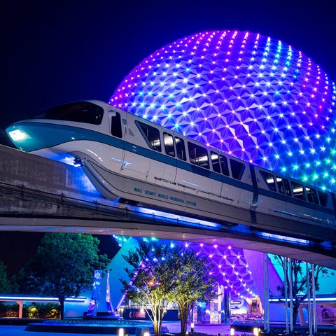 A Monorail ride offers a stunning nighttime view o