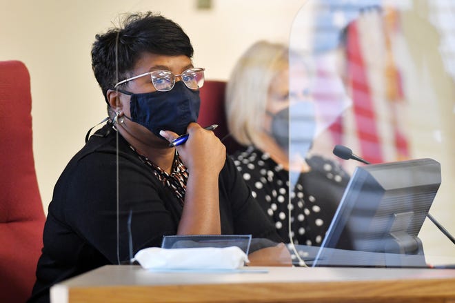 The Superintendent of Duval County Public School, Diana Greene listens to public comments during a school board meeting.