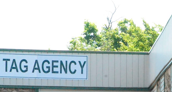 A tag agency sign in Shawnee.