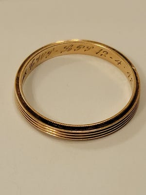 Annette Sharp's grandson Austin Worsham, 13, discovered a wedding band from 1942 in a plastic bag filled with coins. The ring doesn't belong to anyone in their family. Sharp is now trying to find the family of the ring's owner so she can return it to them.