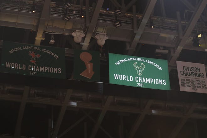 The Milwaukee Bucks' 2021 championship banner is unveiled during Milwaukee Bucks ring ceremony before the season opener vs. the Brooklyn Nets at Fiserv Forum in Milwaukee on Tuesday, Oct. 19, 2021. -  Photo by Mike De Sisti / Milwaukee Journal Sentinel via USA TODAY NETWORK