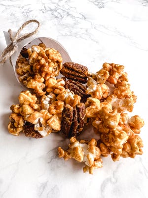 Bourbon Pecan Praline Popcorn is a yummy munch for tailgating, movie nights on the couch, Halloween parties or any time.
