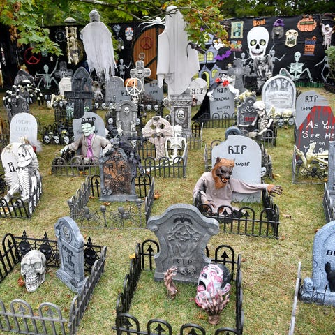 Halloween decorations fill a back yard in Evesham 