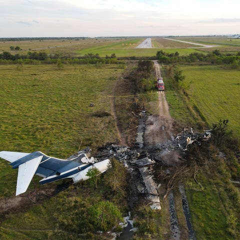 The remnants of an aircraft, which caught fire soo