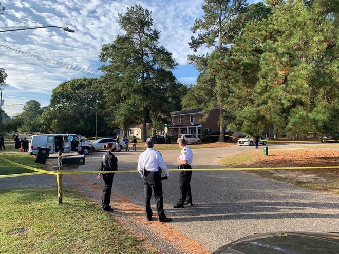 Fayetteville police investigate an apparent murder-suicide Thursday morning on Miller Avenue.