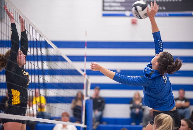 Wynford's Averi McMillan hits a ball toward Colonel Crawford's Rylee Ritzhaupt.