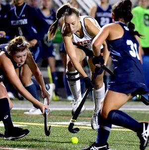 Central York's Grace Harrold, seen here at center in a file photo, scored three goals in the Panthers' 4-1 victory over Susquehannock on Saturday morning in the York-Adams League field hockey championship game on Saturday morning.