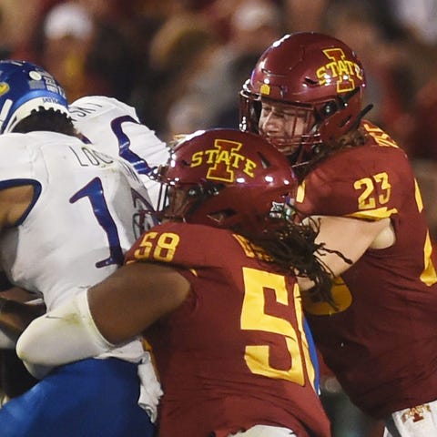 Cyclones linebacker Mike Rose and defensive end Ey
