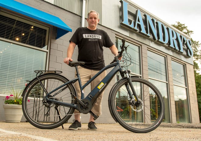 Neil Medin is the store manager of Landry's Bicycles. "We want to keep cyclists on their bikes," he said.