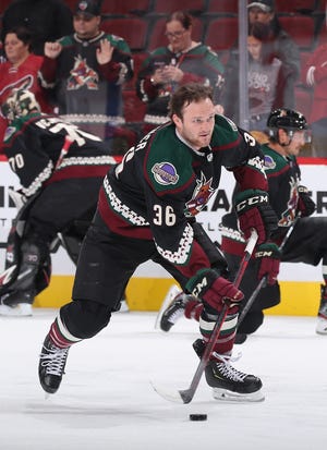 GLENDALE, ARIZONA - OCTOBER 21: Christian Fischer #36 of the Arizona Coyotes warms up before the NHL game against the Edmonton Oilers at Gila River Arena on October 21, 2021 in Glendale, Arizona.