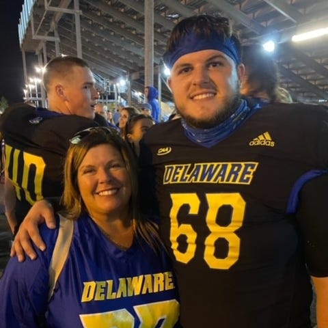Delaware long snapper Jake Reed and his mom Traci 