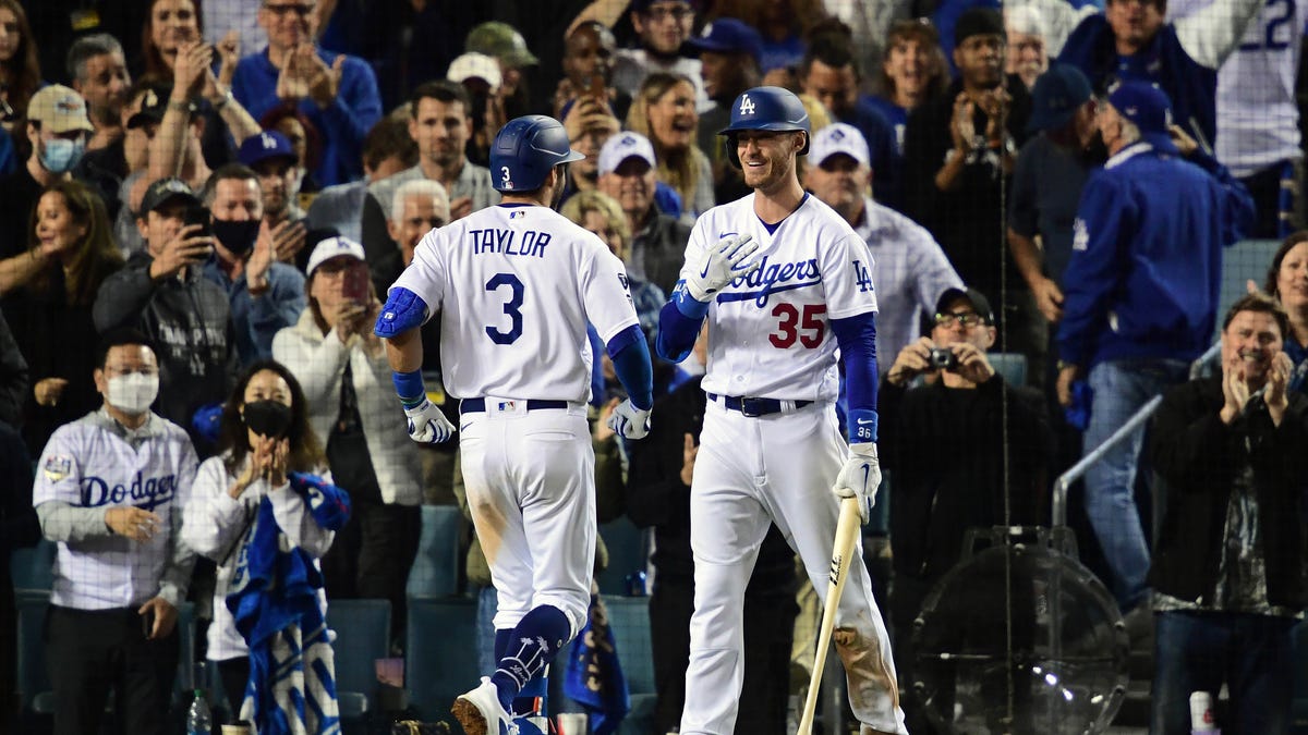NLCS Game 5: Dodgers' Chris Taylor celebrates his third home run of the game in the seventh inning.