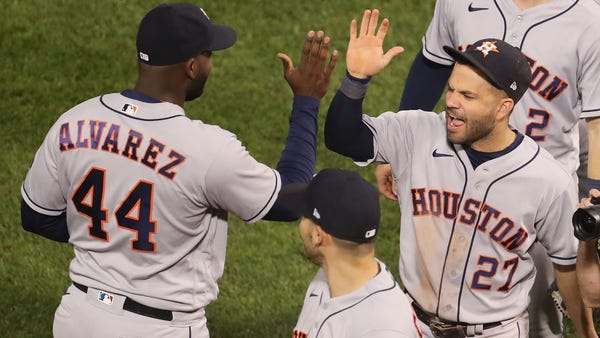 Astros players celebrate after the win in Game 5.