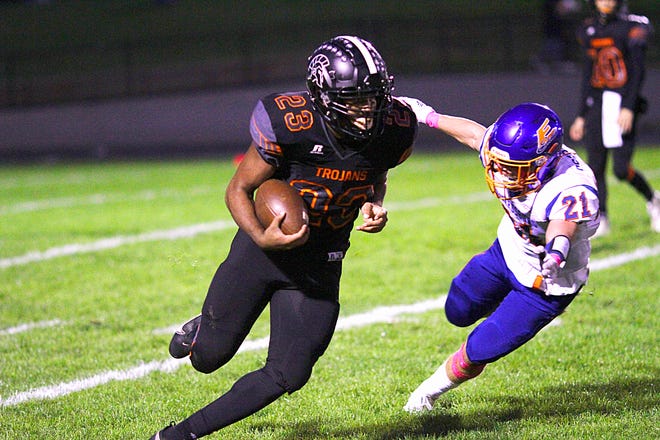 Jacob Thompson breaks free from Connor Ostrander for a first down for Sturgis against Edwardsburg on Friday.
