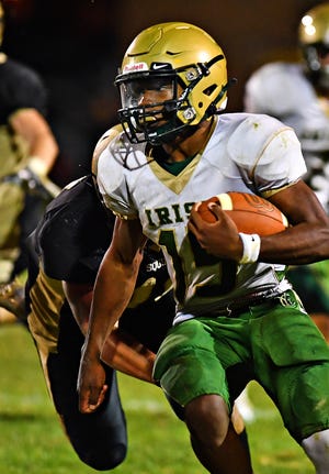 York Catholic's Levan McFadden carries the ball during Division III title football action at Delone Catholic High School in McSherrystown, Friday, Oct. 22, 2021. York Catholic would win the game 13-6. Dawn J. Sagert photo