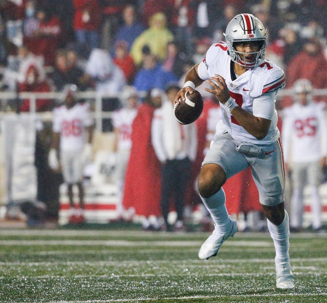 Ohio State Buckeyes quarterback C.J. Stroud (7) looks to pass during the third quarter of a NCAA Division I football game between the Indiana Hoosiers and the Ohio State Buckeyes on Saturday, Oct. 23, 2021 at Memorial Stadium in Bloomington, Ind.