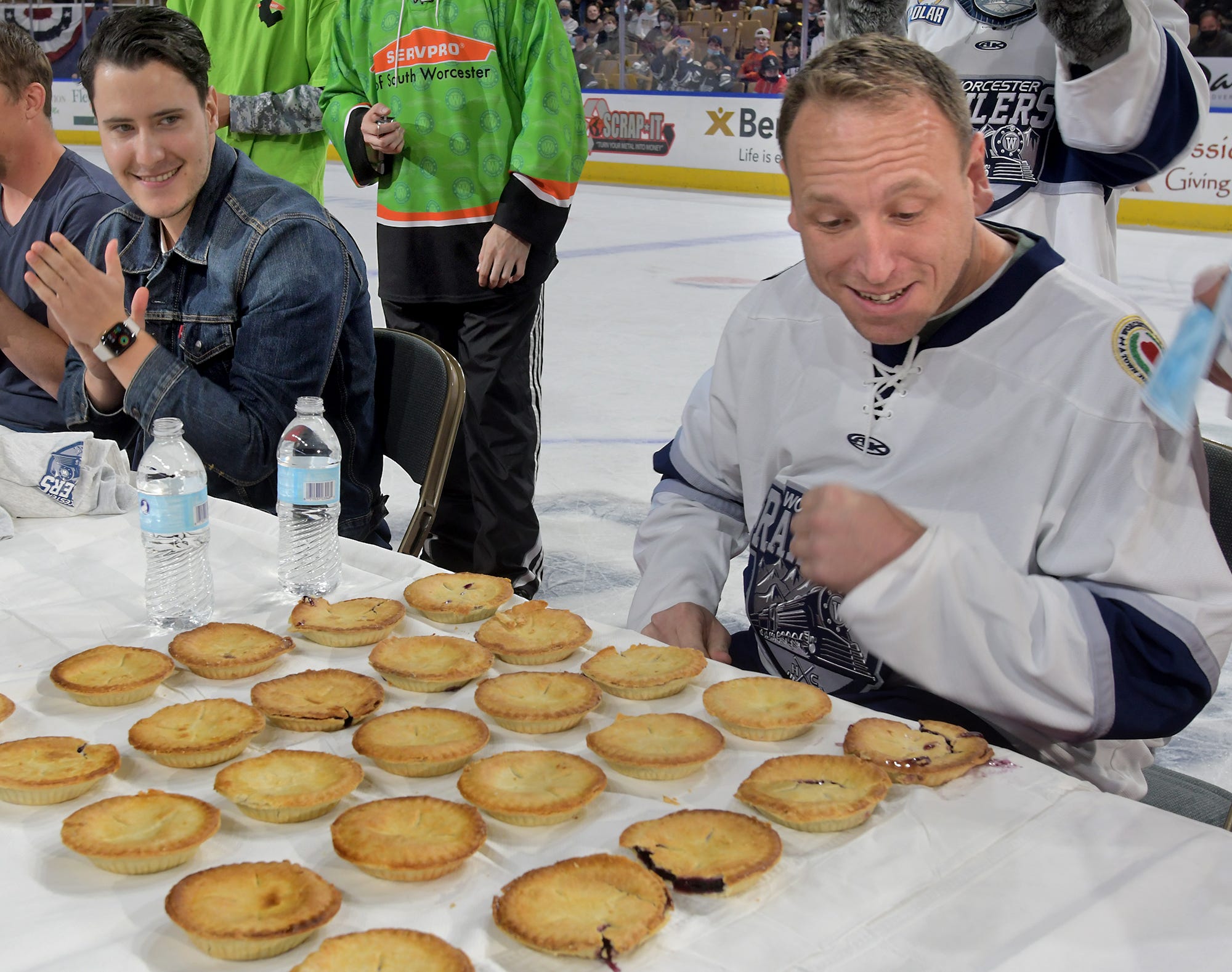 Hungry for hockey: Champion eater Joey Chestnut kicks off Railers' season  by devouring 12 Table Talk pies